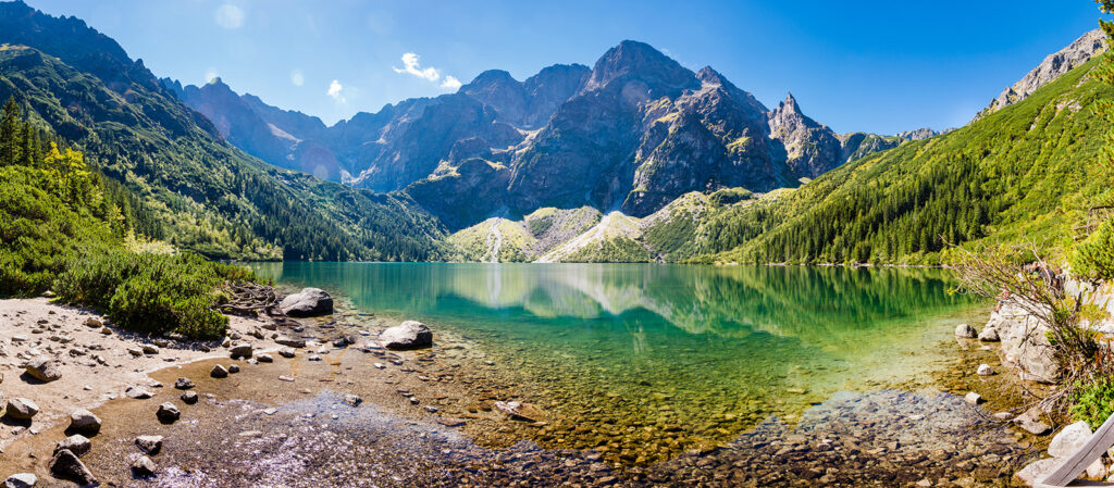 Mountain lake between cliffs — full design