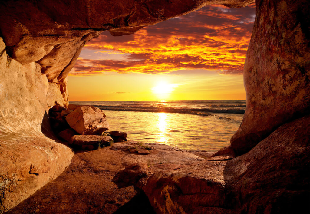 Sunset through a cave — full design